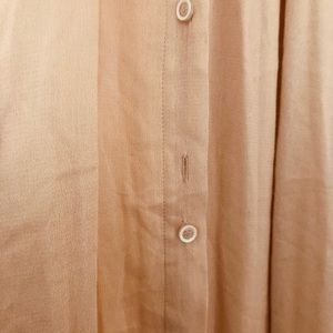 Bella dress in cream with missing button.